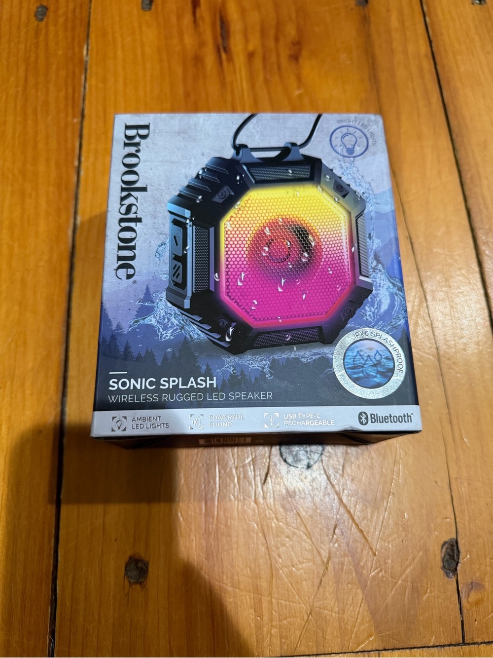 Brookstone Sonic Splash Wireless Speaker — Black with Yellow-Pink Gradient LED